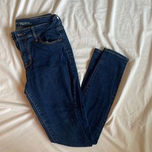 Old Navy mid-rise rockstar jeans. Dark blue wash. Size 4